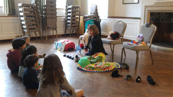 Beverley Brenna presenting to children at London House for Overseas Graduates, London, England