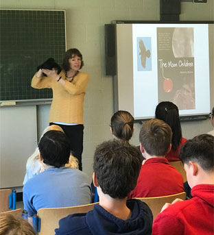 Bev presenting to students in Montreal, Quebec